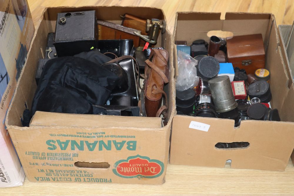 A quantity of cameras and camera equipment